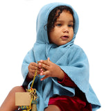 Mhug Poncho Misto Cachemire di colore carta da zucchero indossato da bebè di 10 mesi circa dettaglio del cappuccio