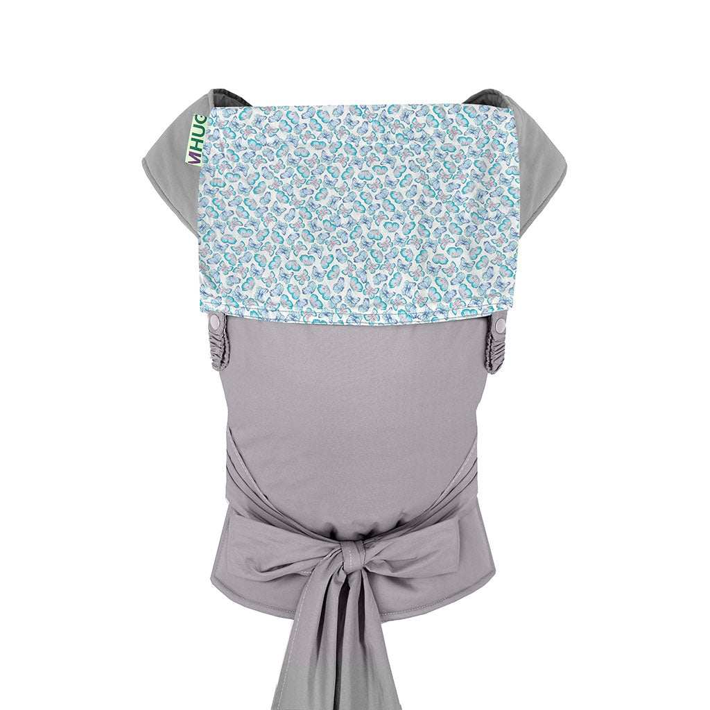 portabebè mhug mei tai collezione fantasia modello Jungle fondo di base grigio con bavero fantasia farfalle bianche e azzurre bottoni a pressione grigi visione totale frontale del portabebè