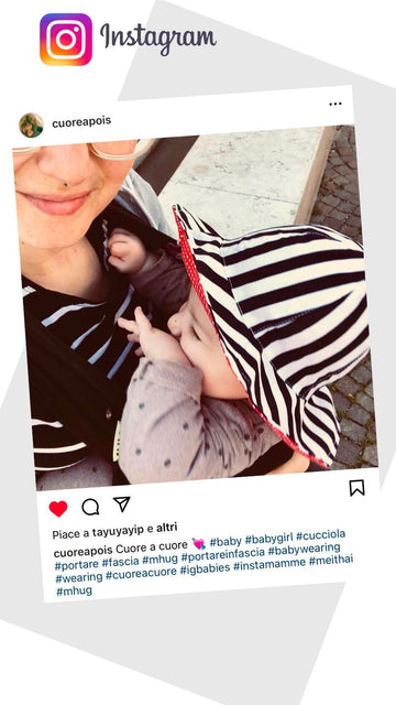 Post @cuoreapois bebè felice e sorridente mentre viene portato in un portabebè Mhug Mei Tai  